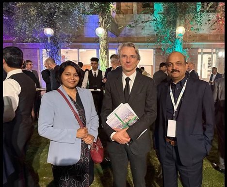 Advancetech team with international partners at an industry event